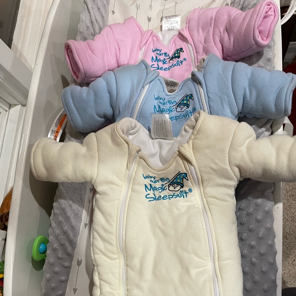 Three (3) Merlin’s magic sleep suits size small (3-6mos)